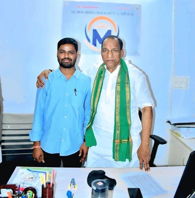 Visitor with our proprietor at the Sri Mokshitha Management and Services office